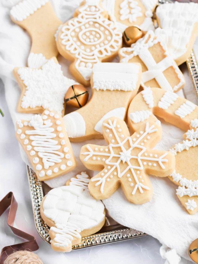 beautifully decorated shortbread cookies with royal icing, close up, warm lighting