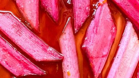 close up shot of sliced rhubarb stalks with sugar