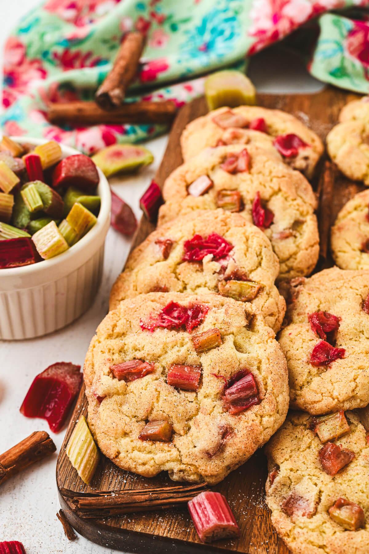 maple glazed rhubarb cookies on a wooden surface