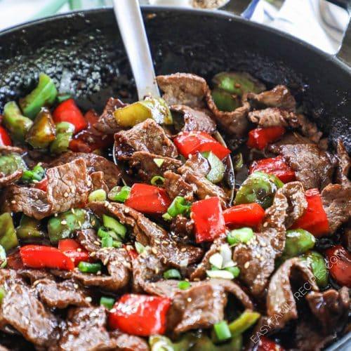 close-up shot of frozen beef and bell pepper stir-fry in a freezer bag