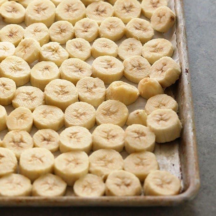 close up of frozen bananas being blended