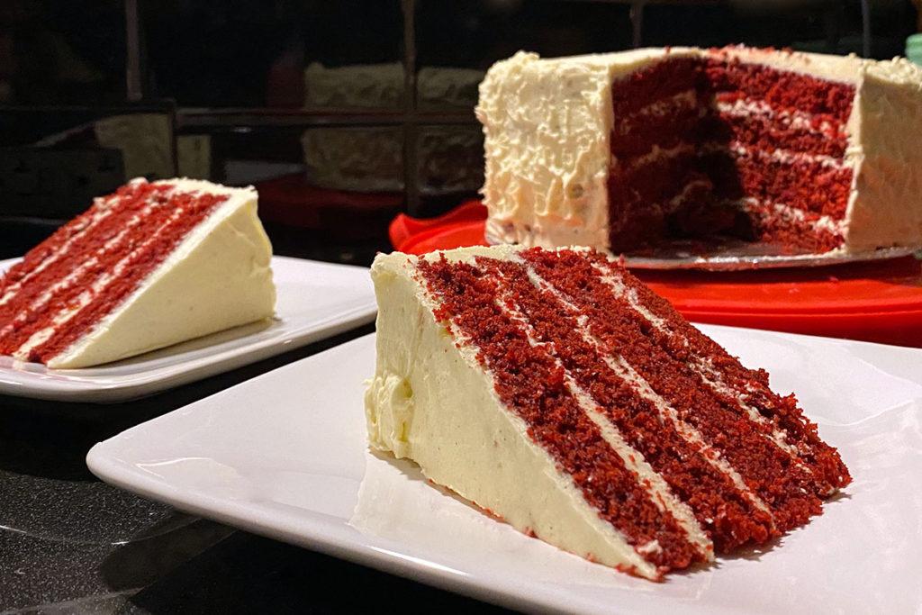 Grandma serving red velvet cake, vintage photo