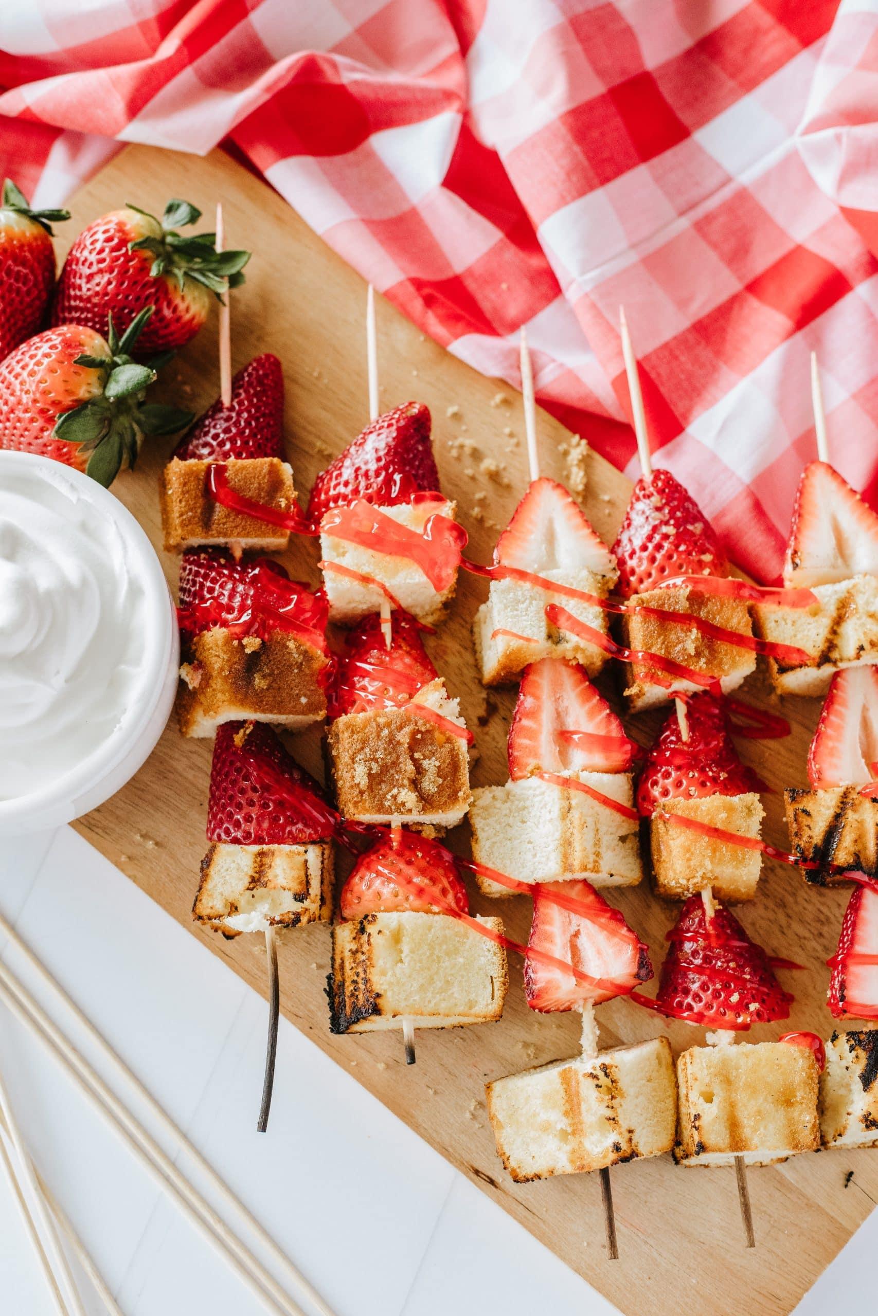Strawberry shortcake salt being sprinkled on grilled chicken