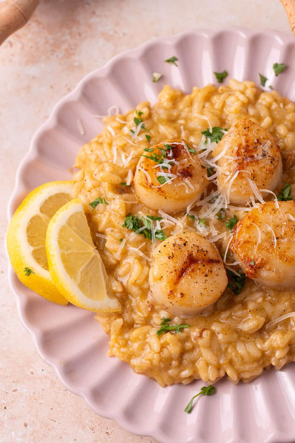 creamy shrimp and scallop risotto being stirred in a pot