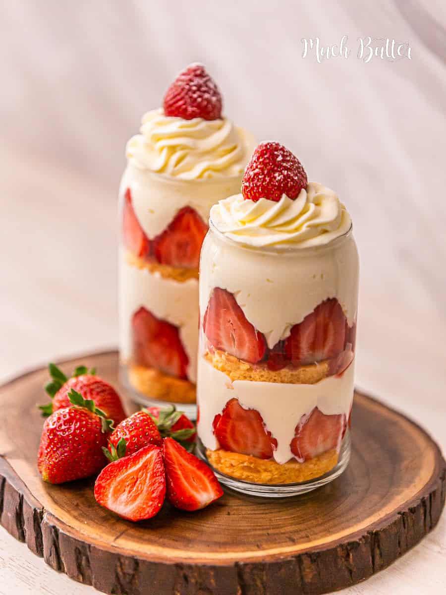 person pouring strawberry cake julep into a glass