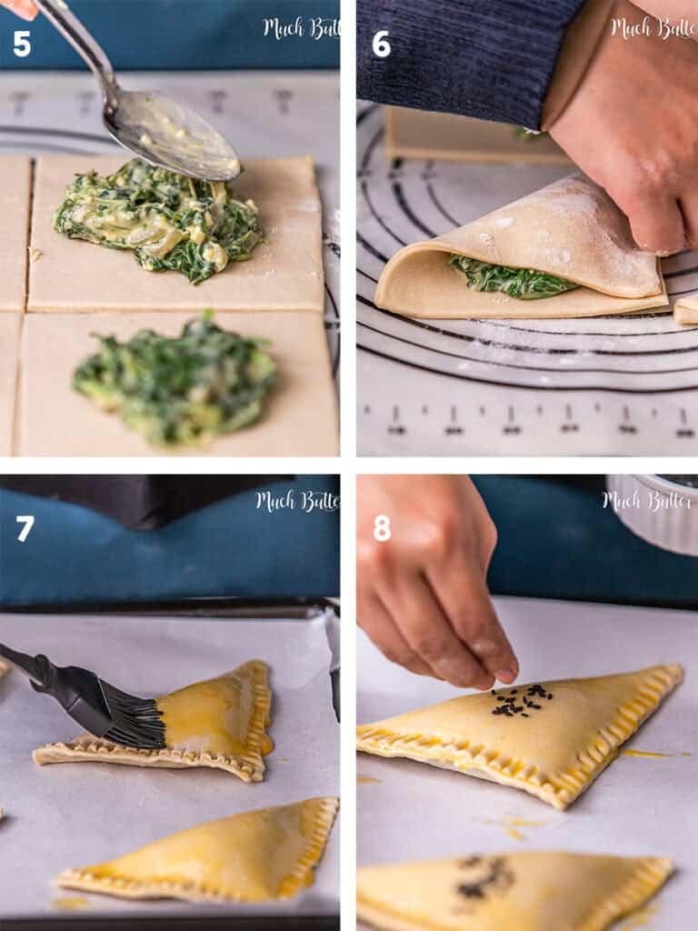 Hand gently folding a puff pastry sheet filled with spinach and feta mixture into a triangle shape