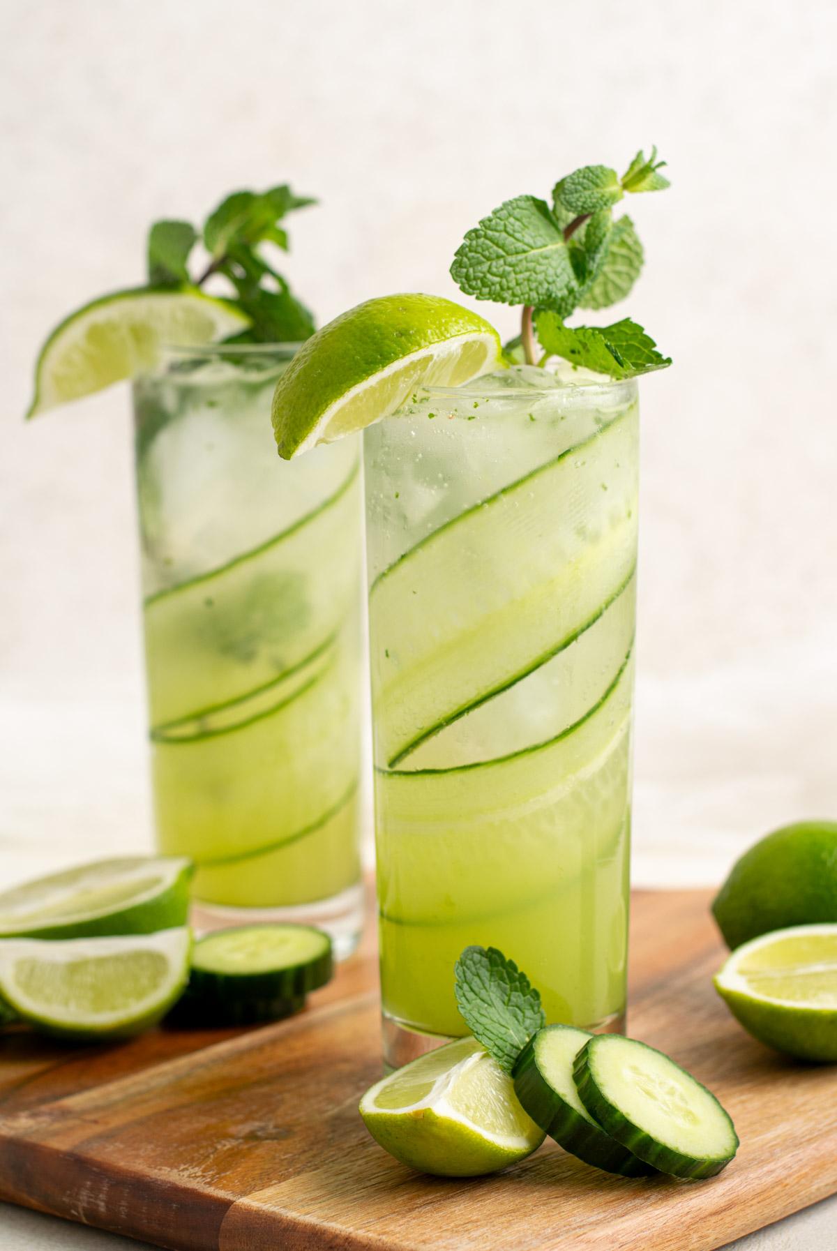 Close-up of a garnished cucumber mint mojito mocktail in a glass
