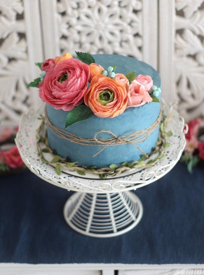 Detailed shot of wafer paper flowers on a birthday cake