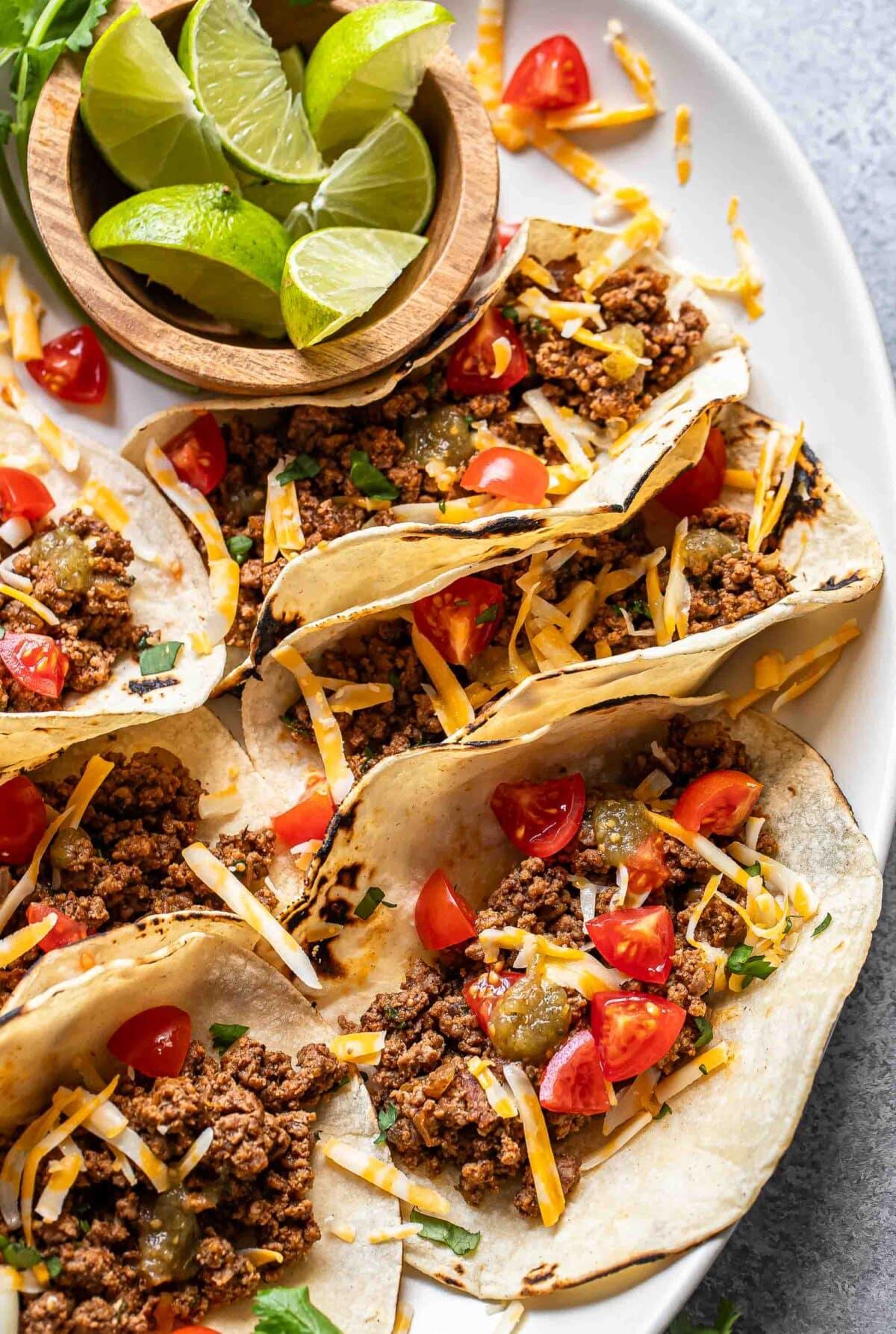 ground beef tacos and lemonade on a picnic table