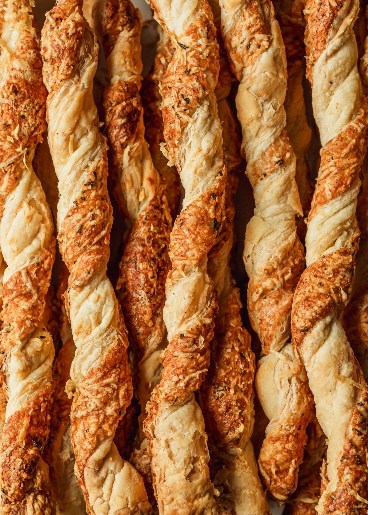 savory puff pastry twists with parmesan cheese close-up