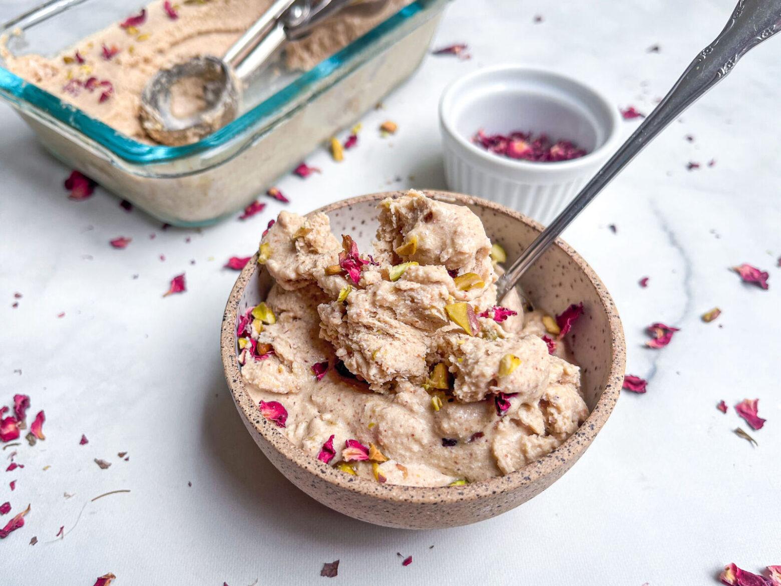 overhead shot of pistachio rosewater ice cream in a container