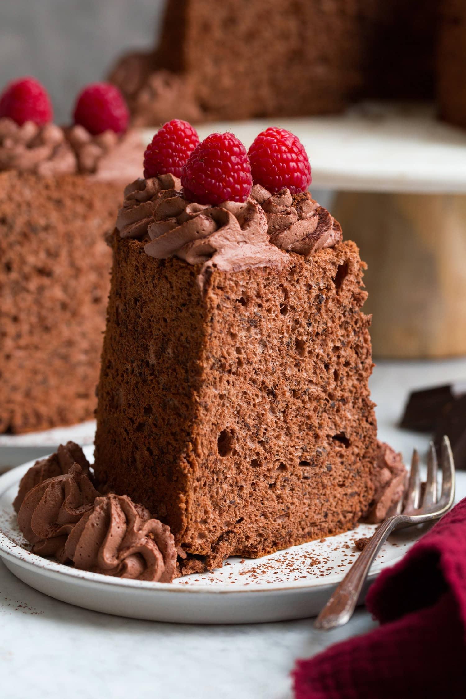 sliced angel food cake with chocolate layers close-up