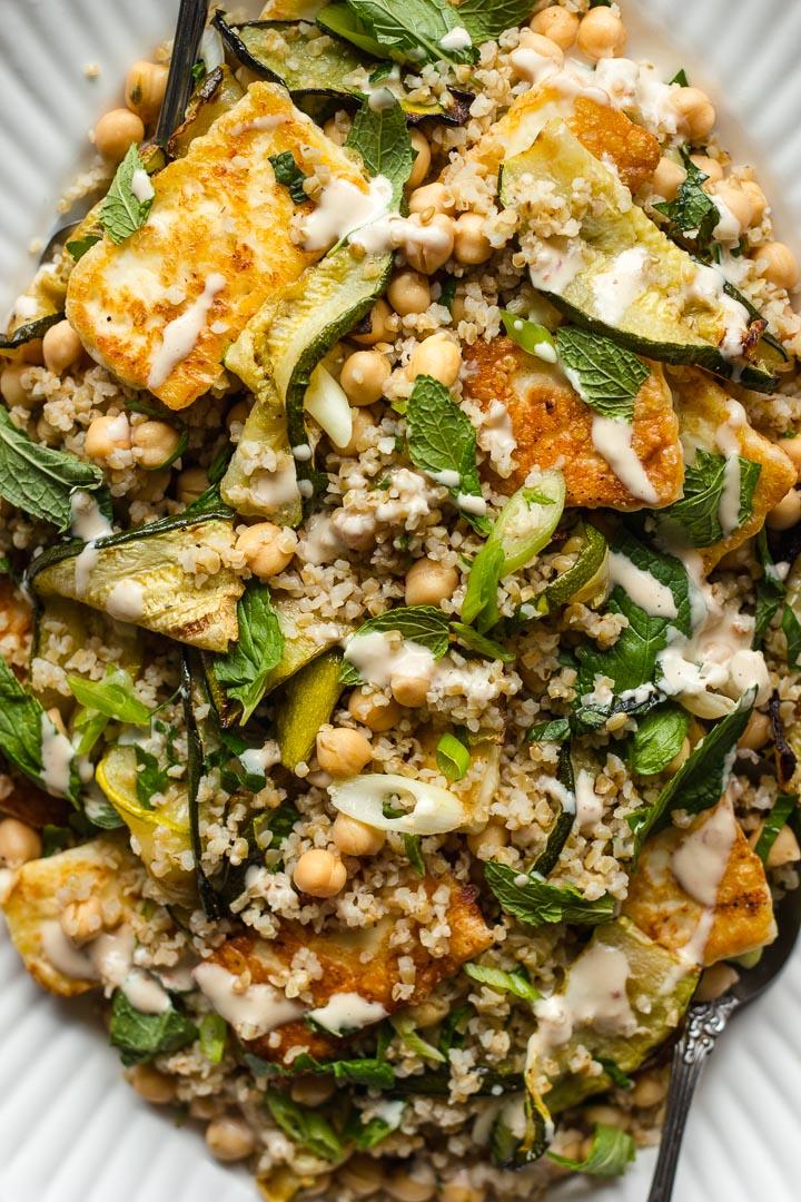 baked zucchini and halloumi dish with fresh mint