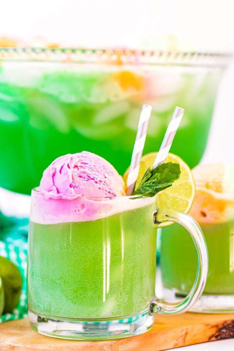 close up shot of rainbow sherbet melting into lemonade