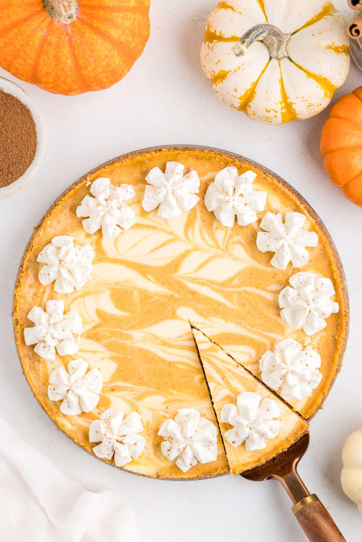 overhead shot of creamy pumpkin swirl cheesecake