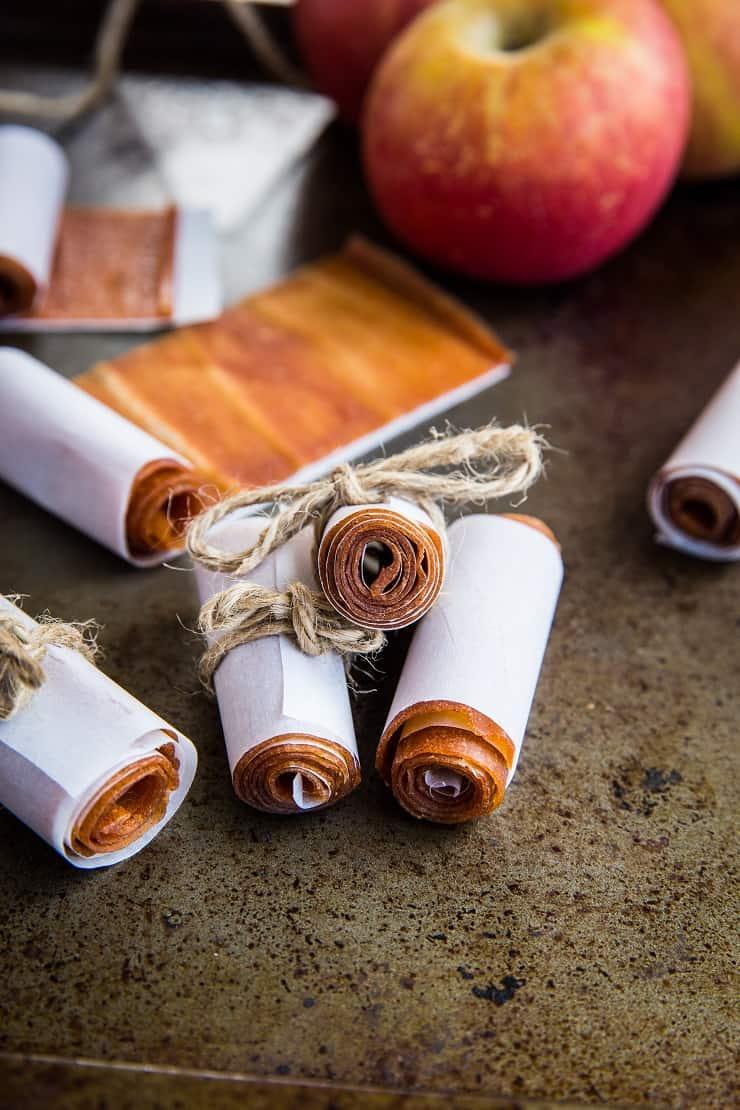 apple fruit leather baked apples on a rustic wooden table