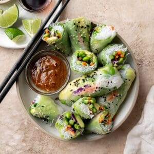 freshly made black rice and edamame spring rolls with sesame dressing