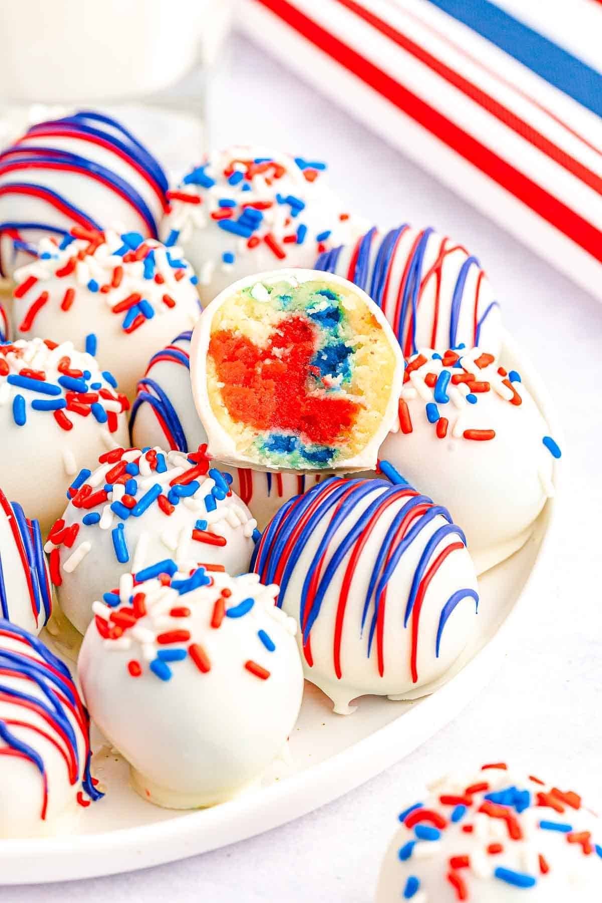patriotic cake pops decorated with red, white, and blue sprinkles