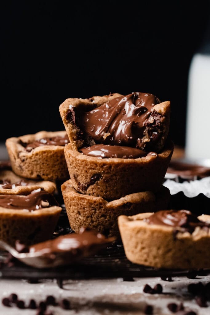 Decadent chocolate cookie stuffed muffins, warm and gooey