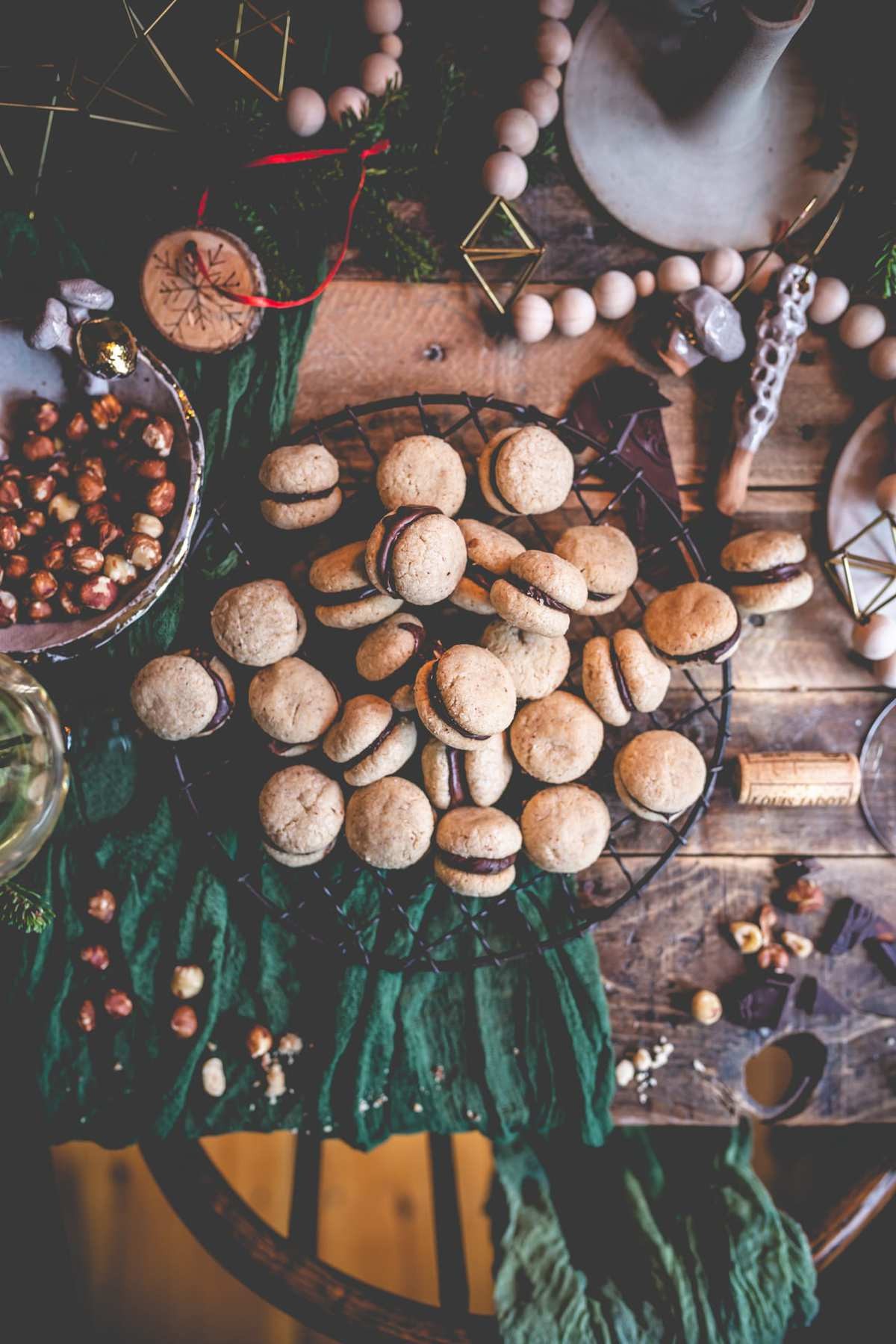 Rhubarb chocolate hazelnut cookies on a rustic wooden table
