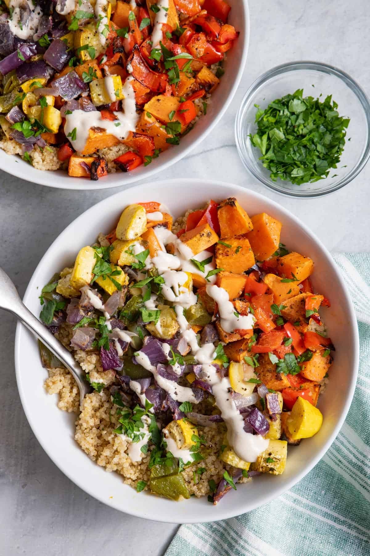 vibrant roasted vegetables and quinoa bowl with a drizzle of dressing