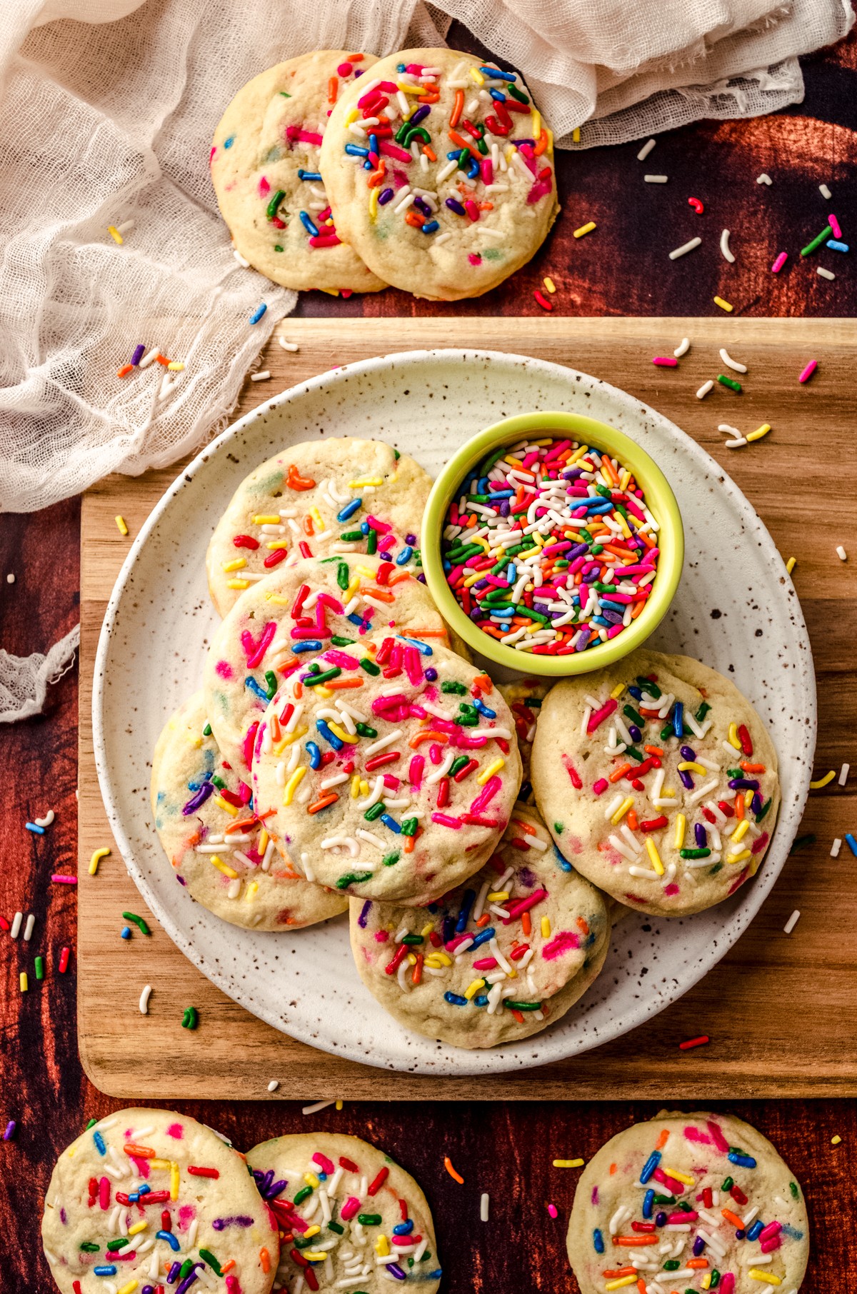 overhead shot of freshly baked sugar cookies with sprinkles
