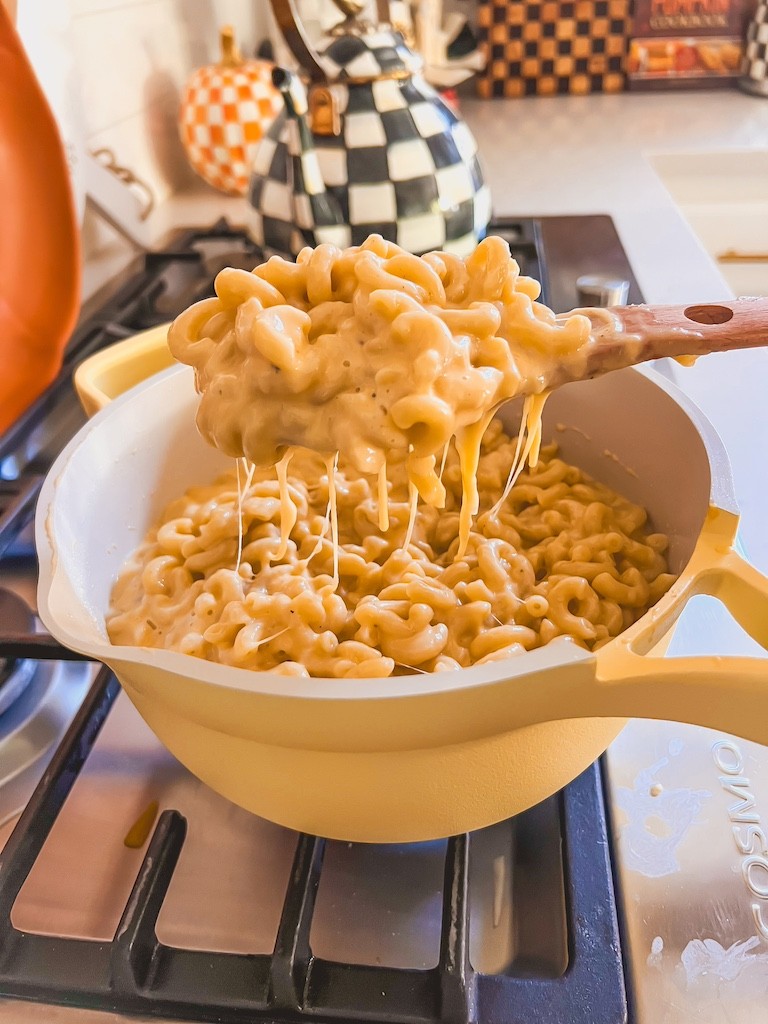 Gooey, creamy one-pot mac and cheese in a large pot, steam rising