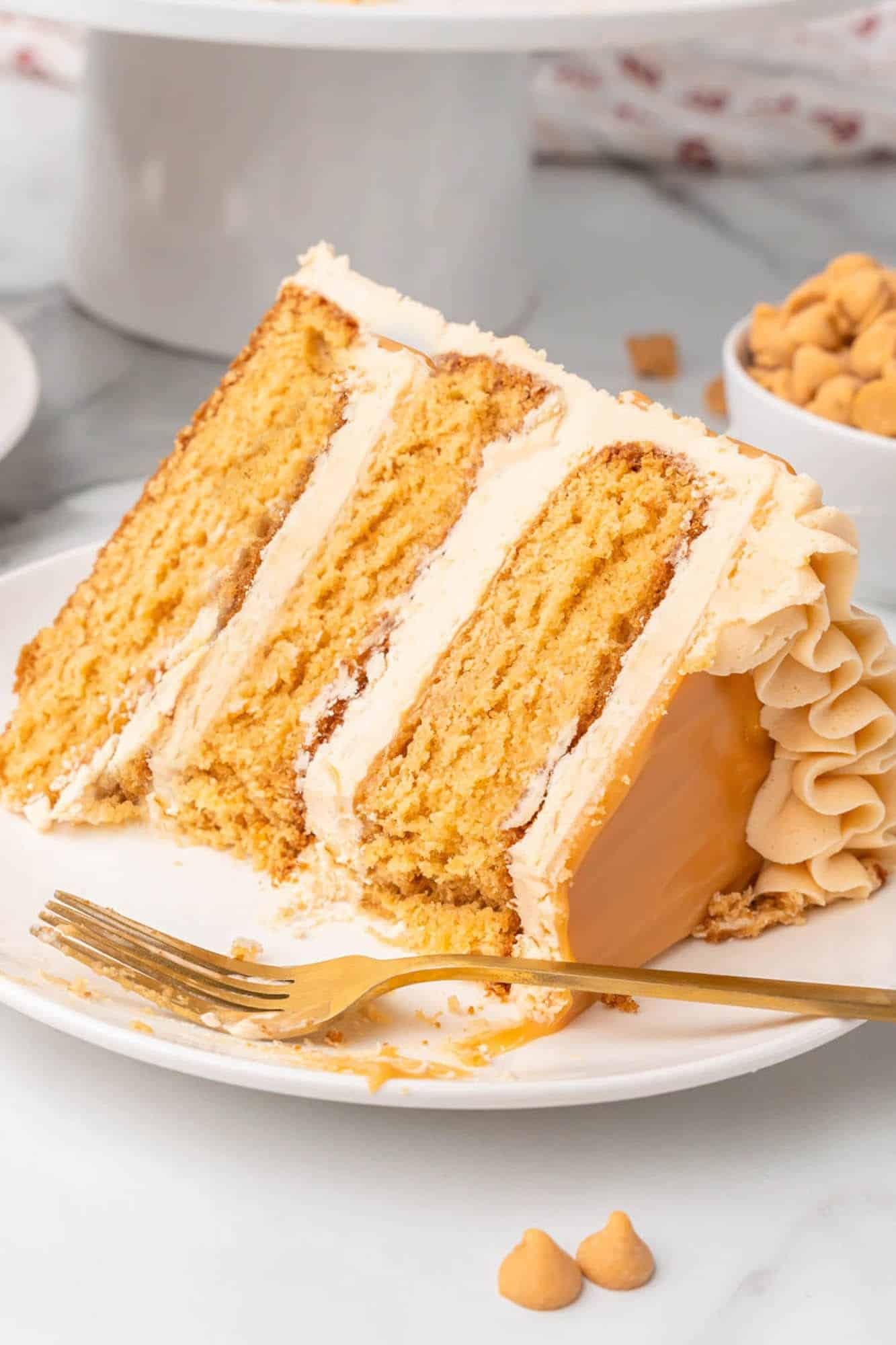 slice of vanilla birthday cake with butterscotch pudding frosting