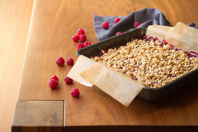 Rhubarb and pear bars on a wooden cutting board