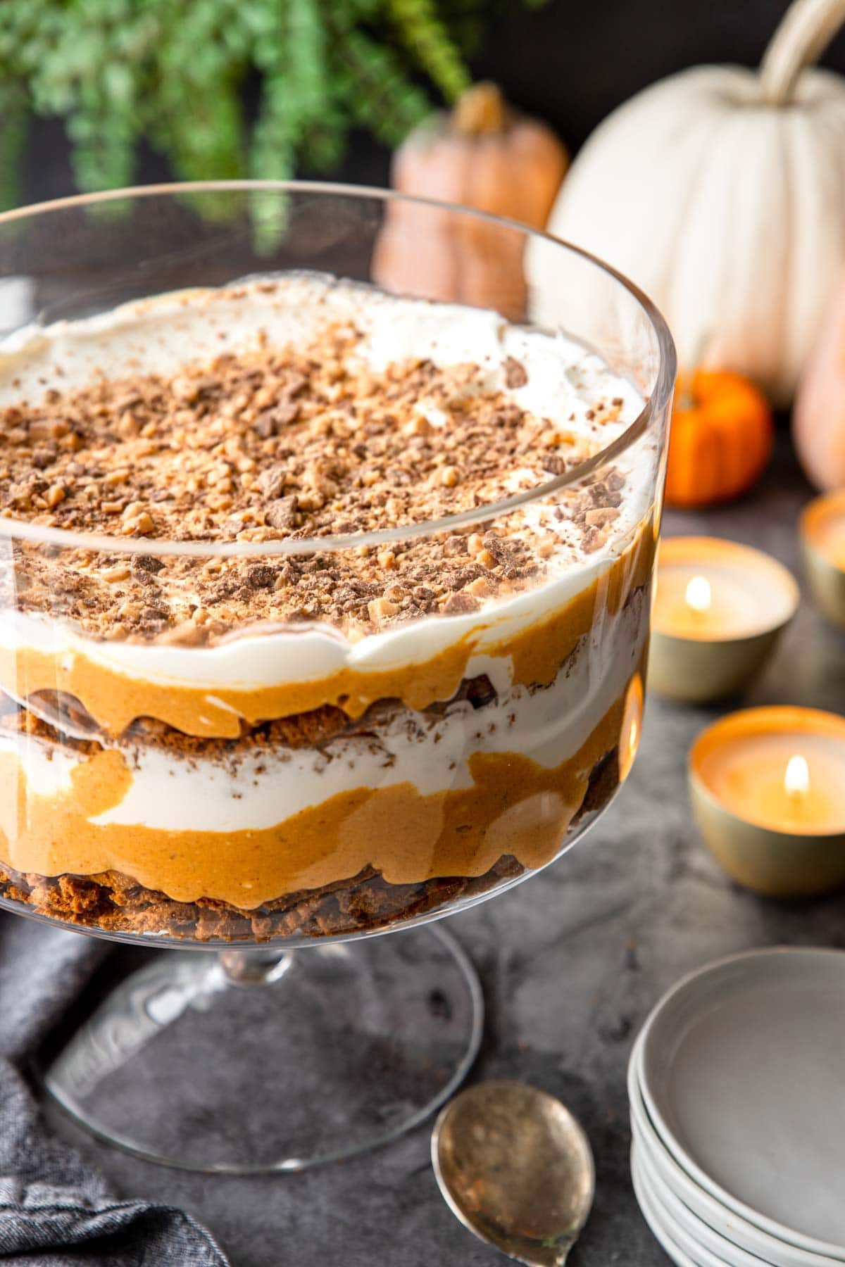 layered pumpkin trifle dessert with whipped cream