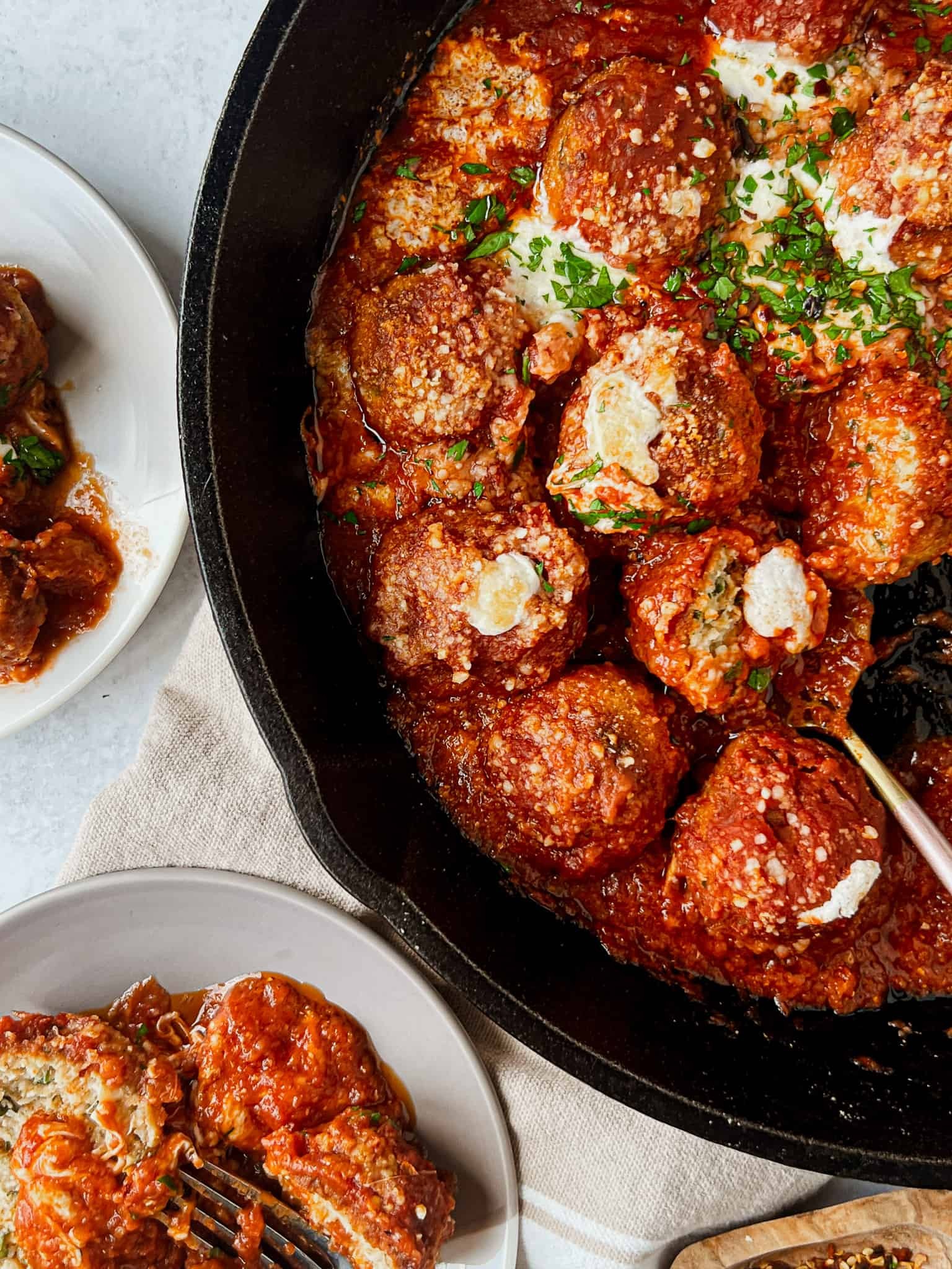 sriracha chicken parmesan meatballs served on a plate