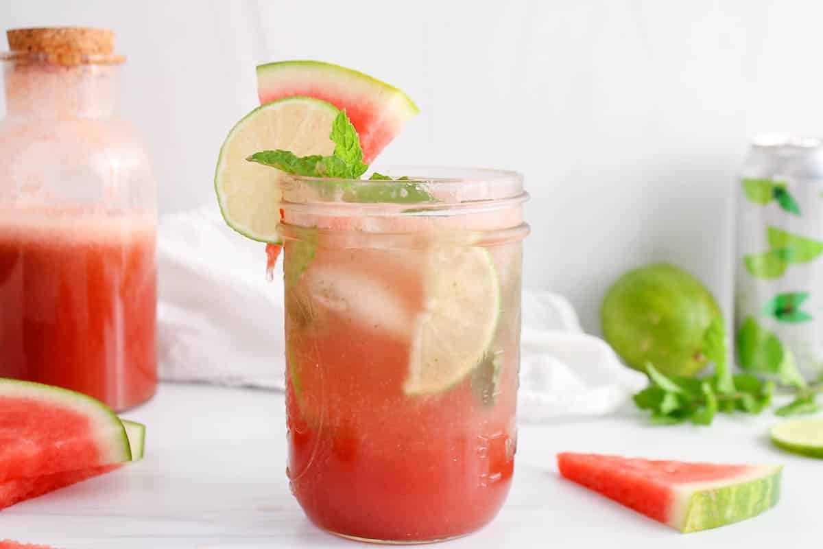 close up of a refreshing watermelon mint virgin mojito in a glass with condensation