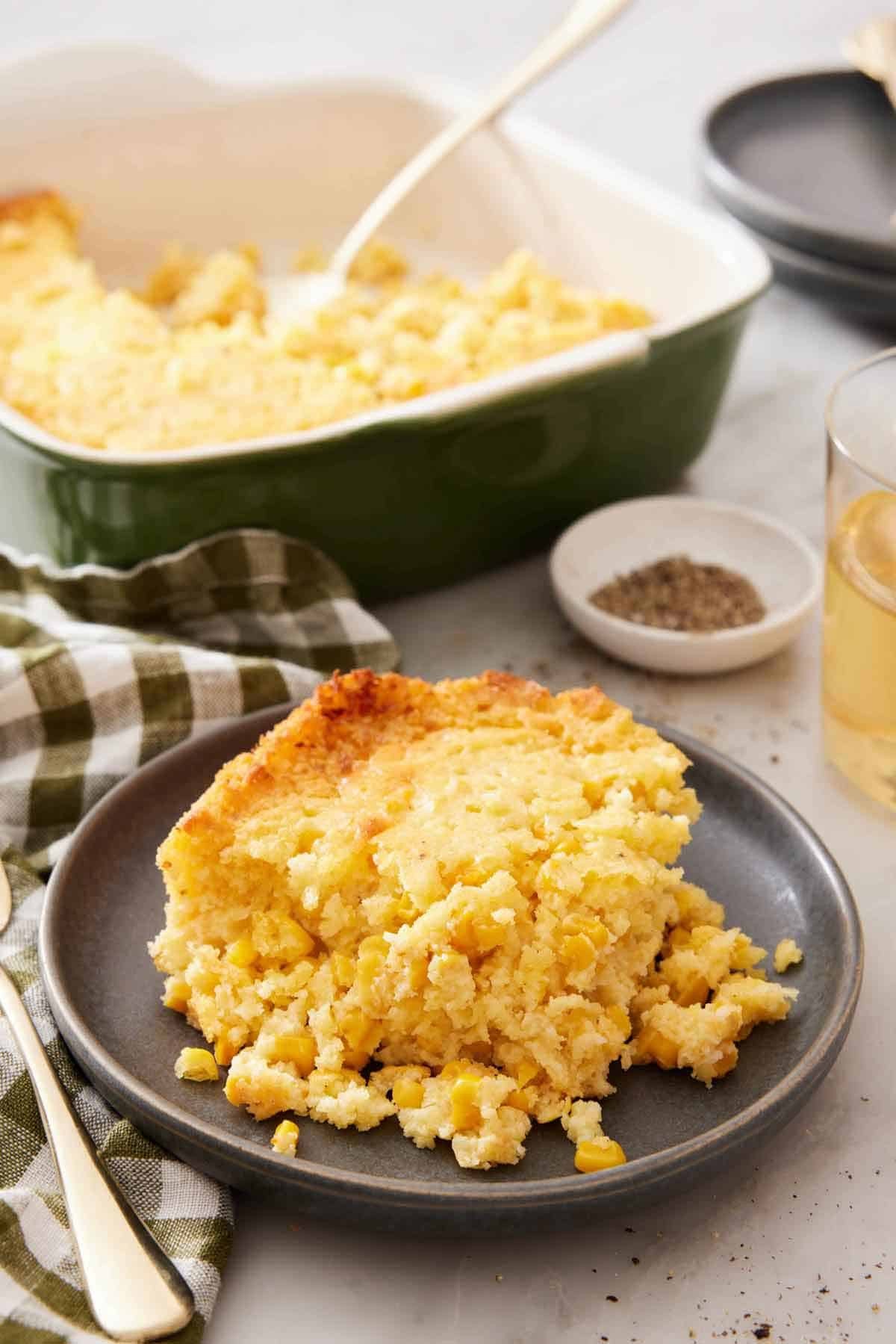 homemade sweet corn casserole with a smooth custard center, golden brown top, served in a rustic dish