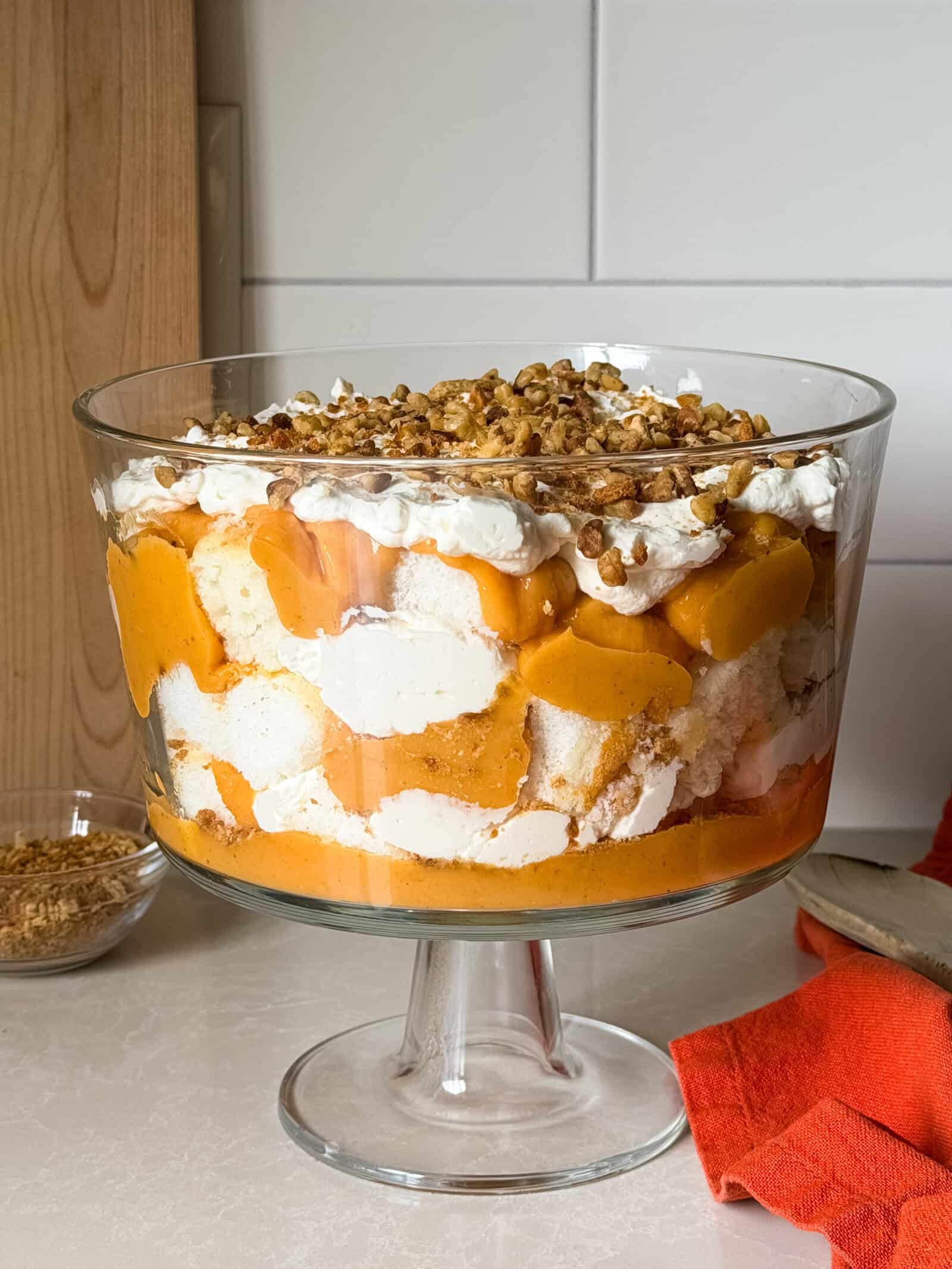layered pumpkin trifle in a glass bowl