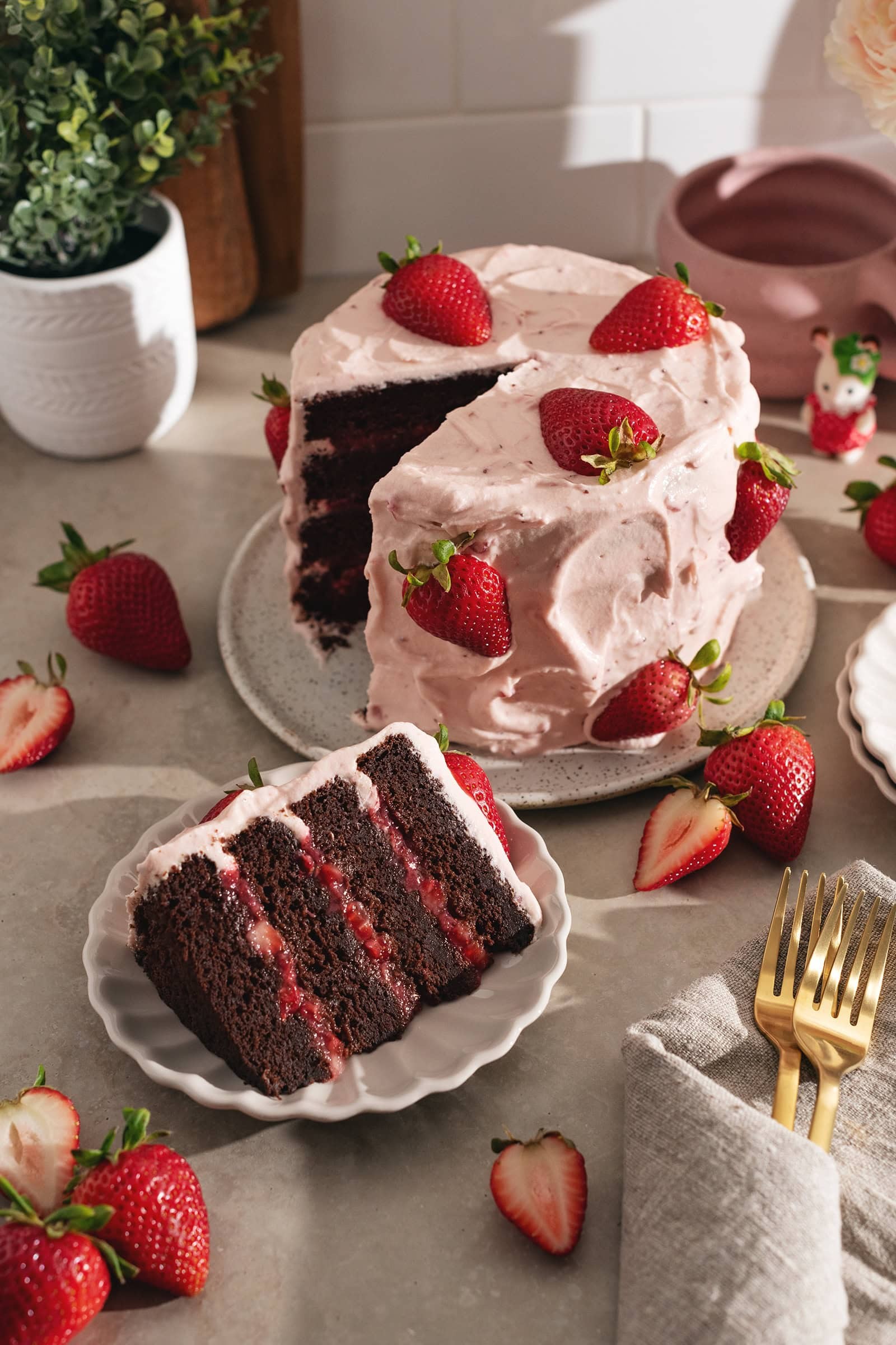 a beautifully decorated strawberry chocolate layer cake