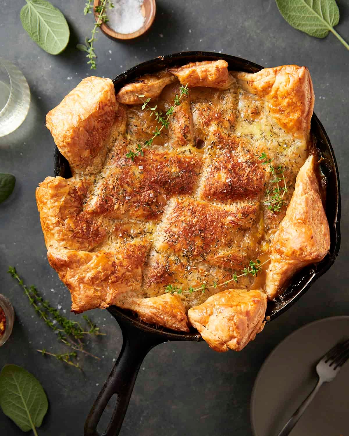 golden brown buttered chicken pot pie, rustic setting, flaky crust