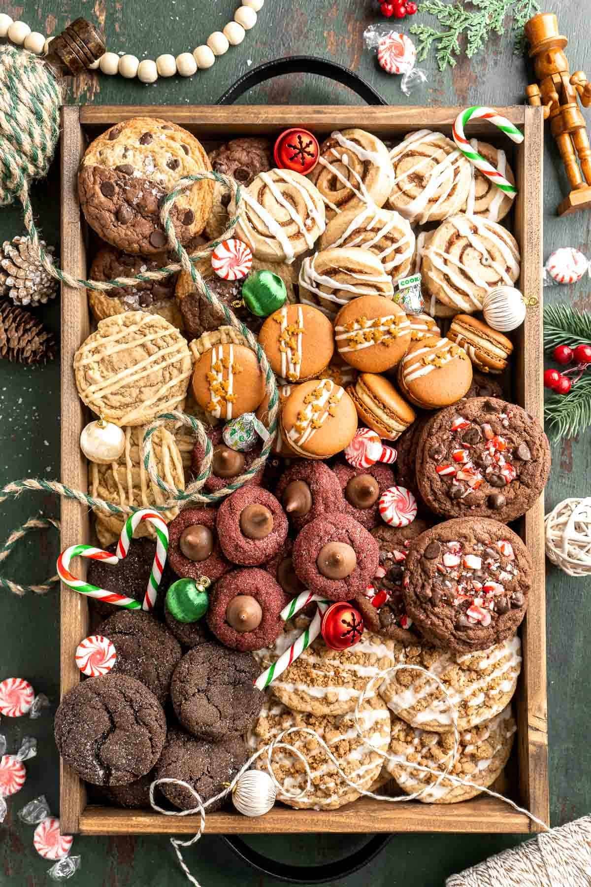 beautifully decorated gingerbread cookies on a festive holiday tray
