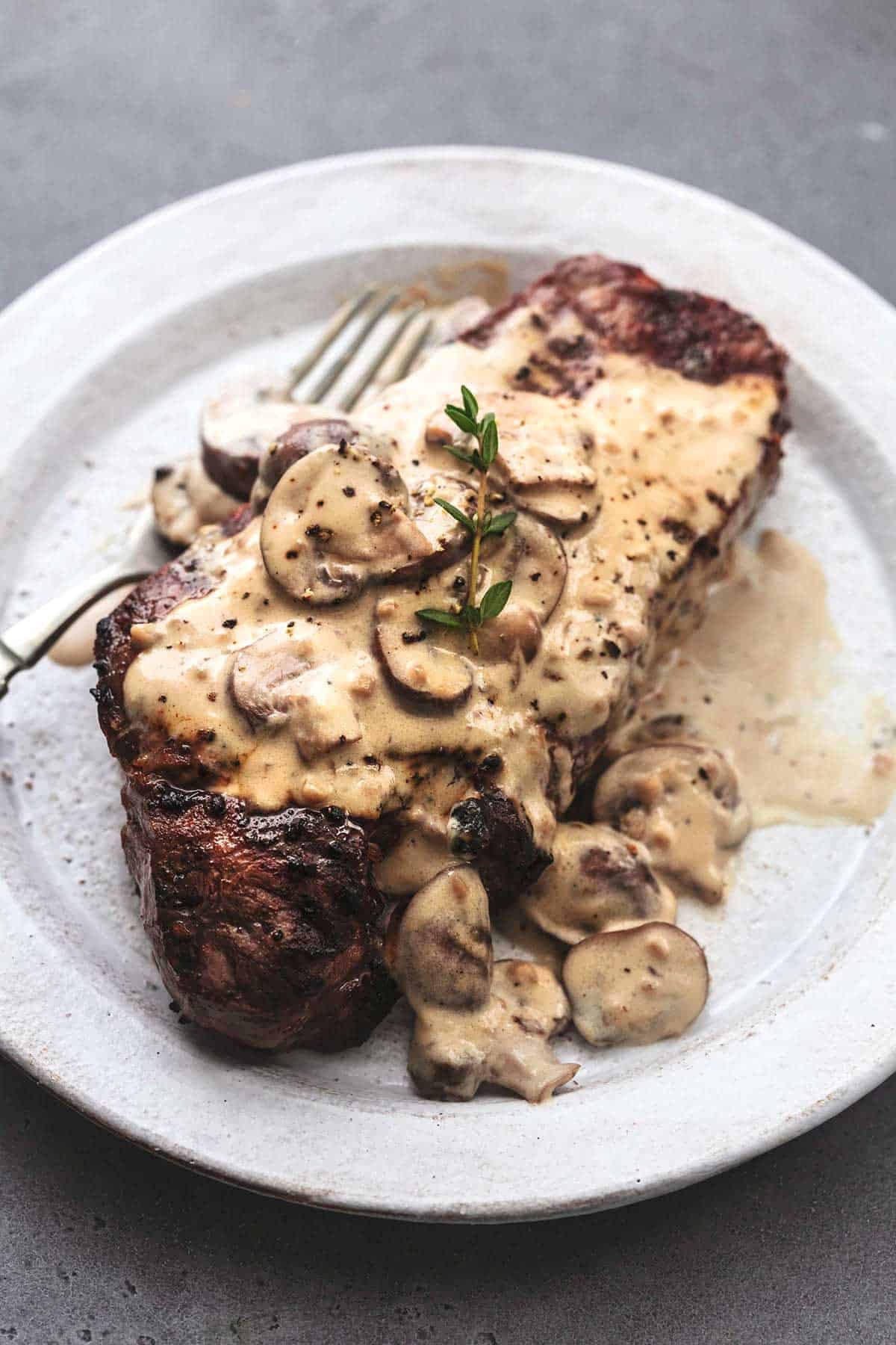 steak topped with creamy mushroom gravy