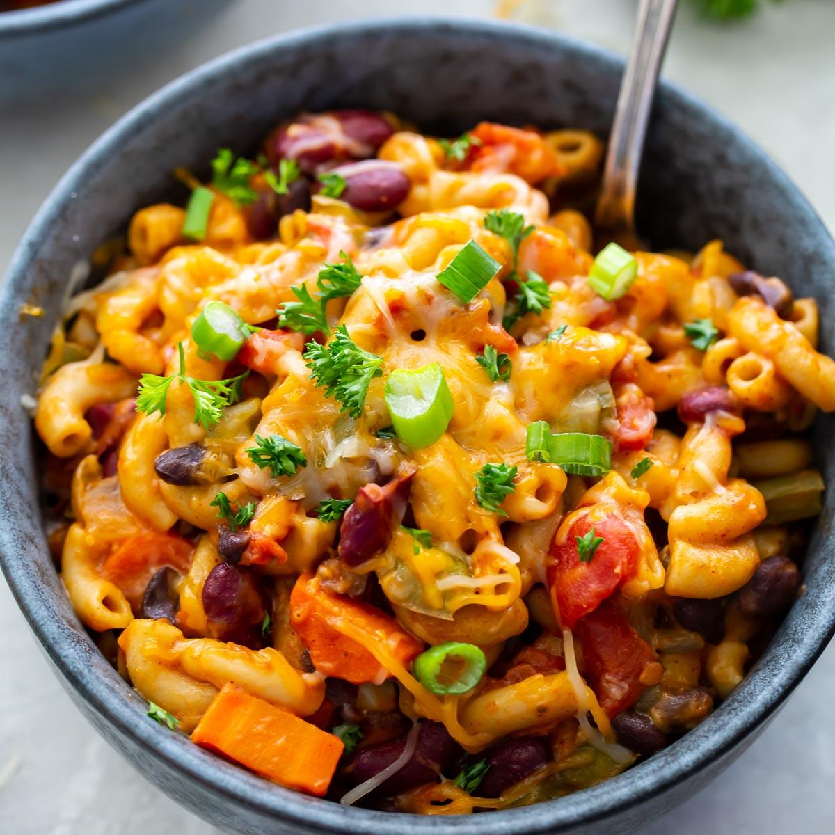 vegetarian chili mac and cheese in a casserole dish