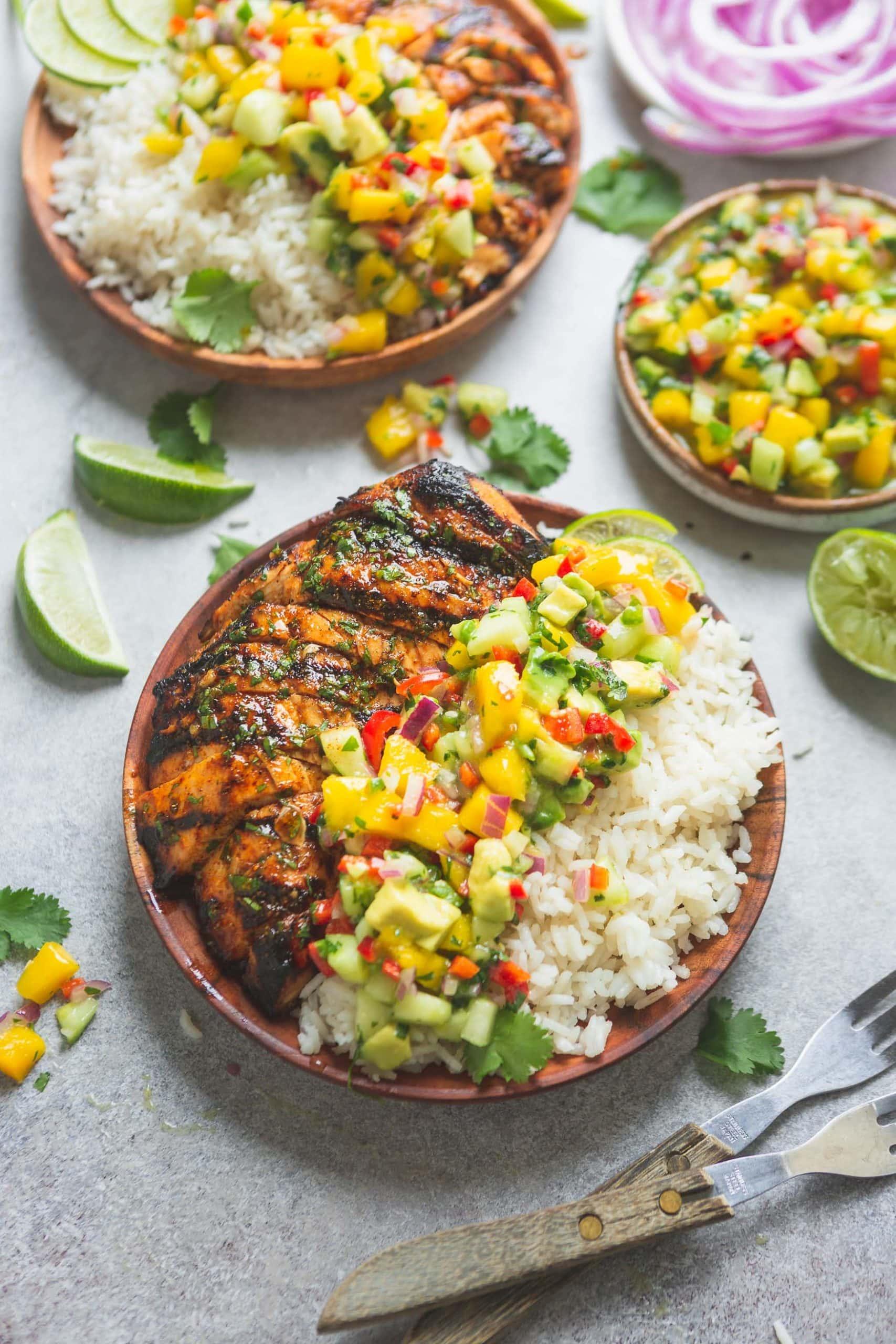 grilled chicken topped with mango salsa served with summer vegetable rice